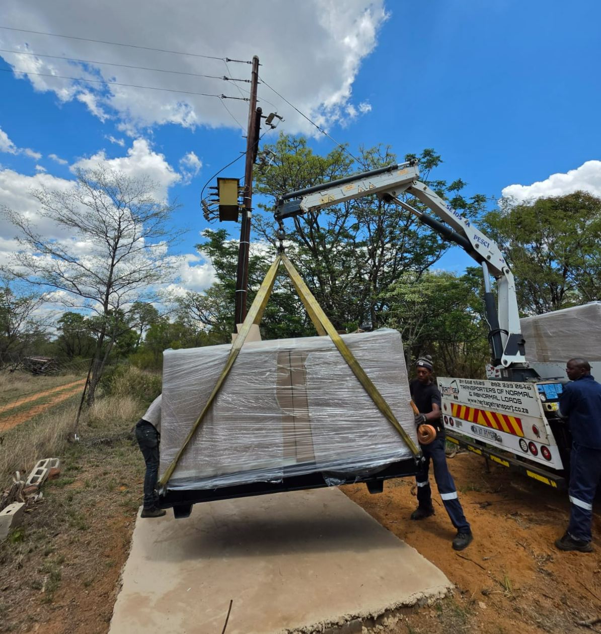 80kVA diesel generator being offloaded by crane truck at a school camp in Cullinan, Gauteng