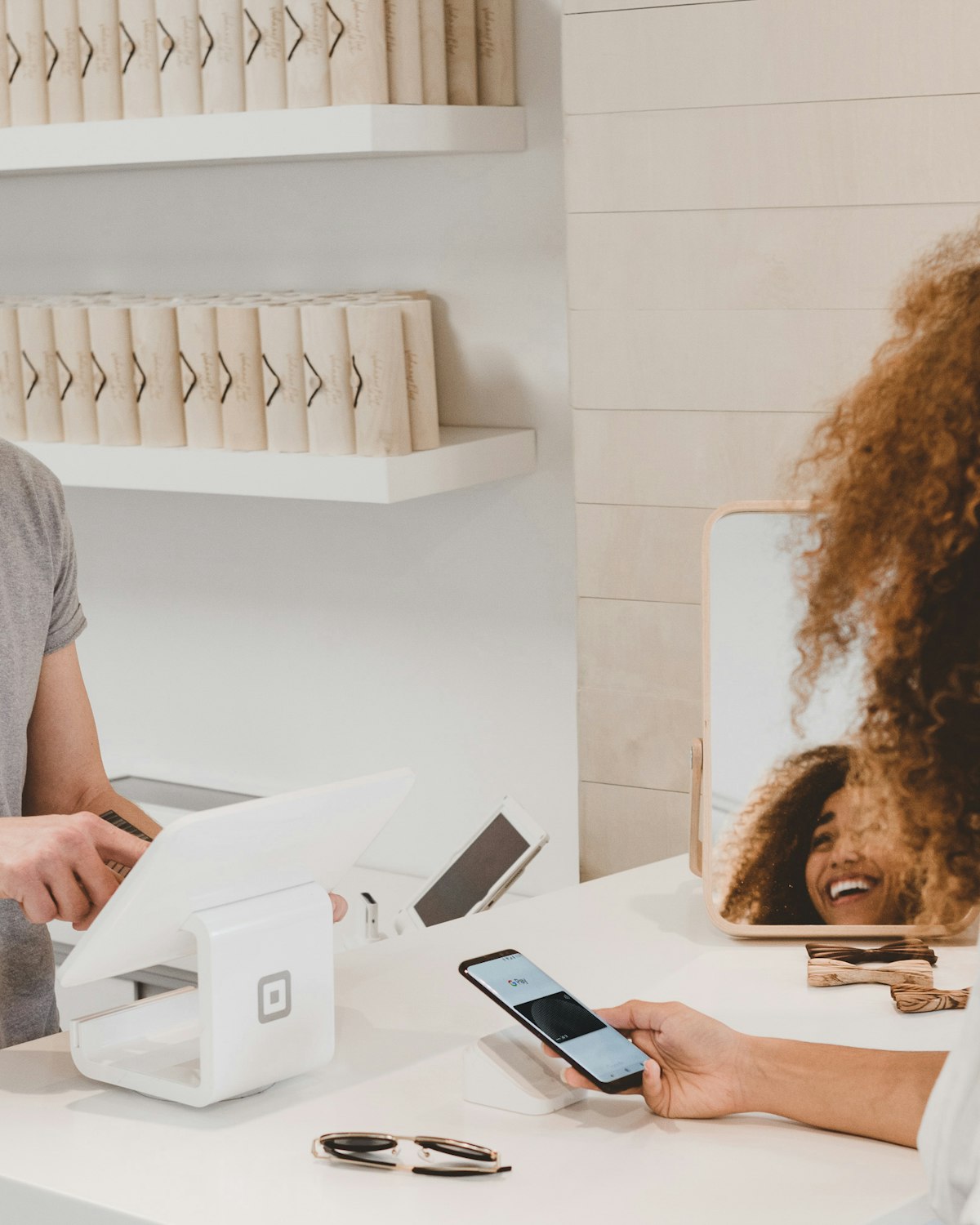Customer at a retail telecom shop counter